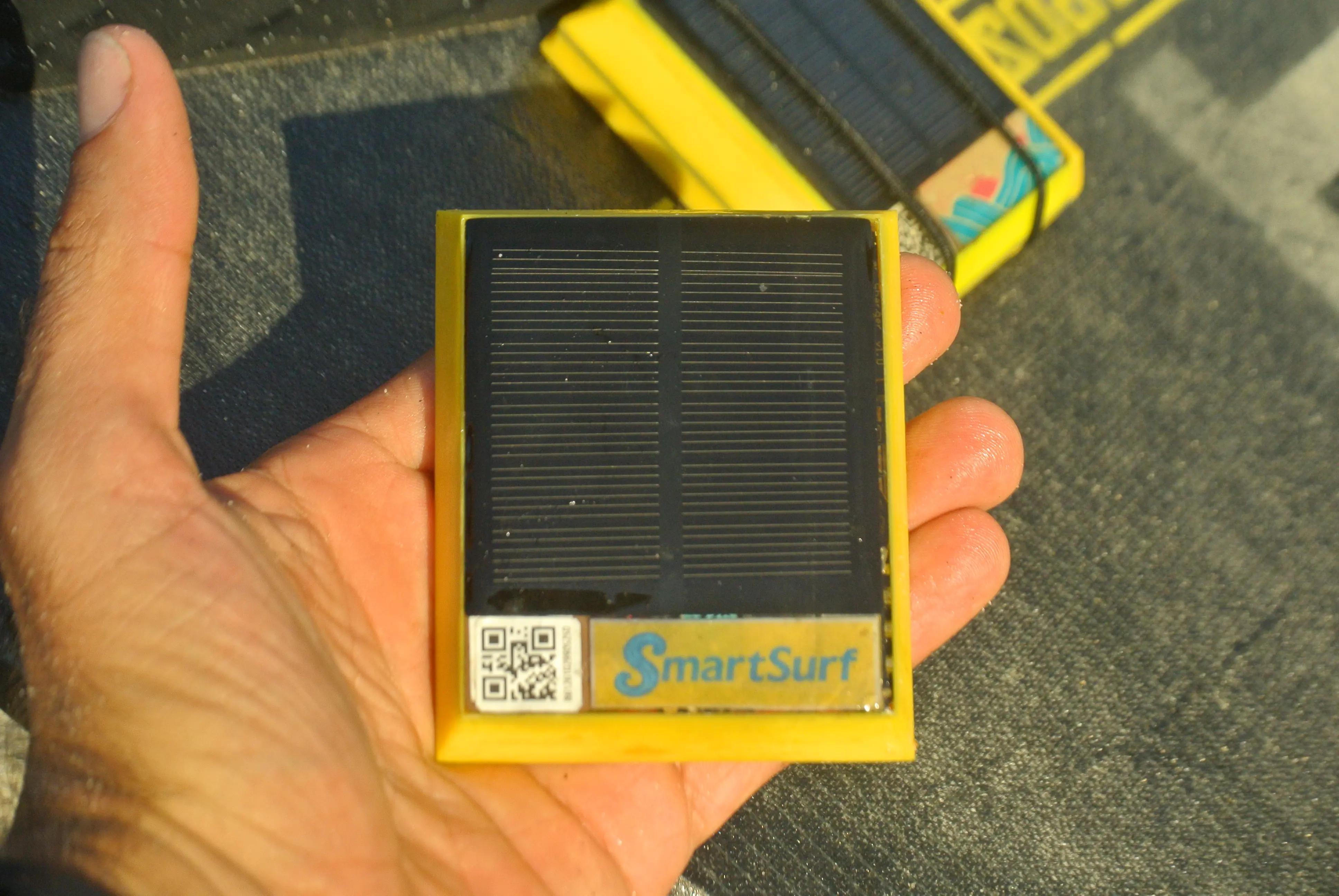 SmartSurf Tracker in hand